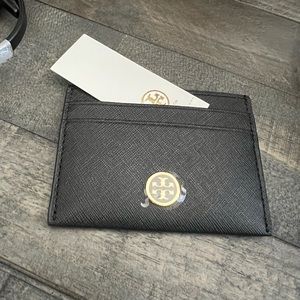 Black card holder with gold letters